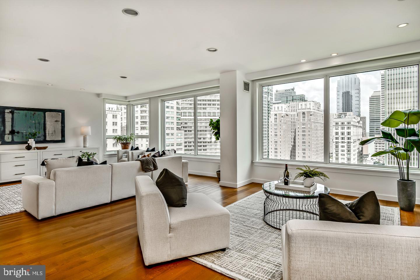 1820 Rittenhouse Square, Unit 1601 Philadelphia, PA 19103 - Photo 14 of 53 a living room with furniture and a large window