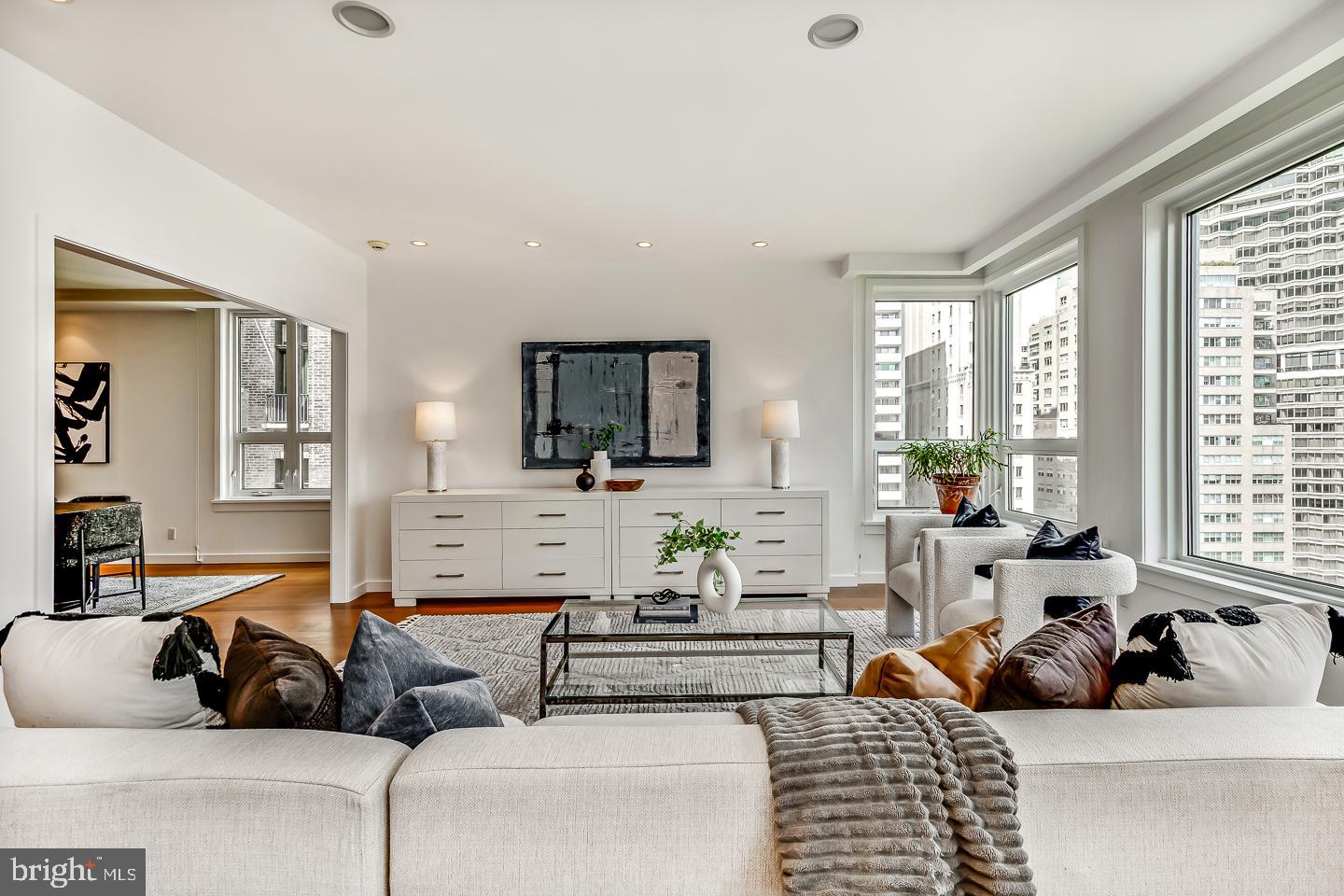 1820 Rittenhouse Square, Unit 1601 Philadelphia, PA 19103 - Photo 17 of 53 a living room with furniture and a flat screen tv
