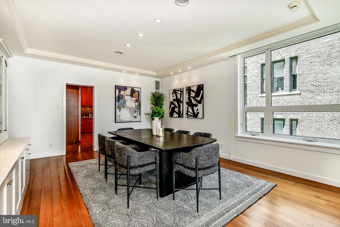 1820 Rittenhouse Square, Unit 1601 Philadelphia, PA 19103 - Photo 21 of 53 a view of a dining room with furniture and wooden floor