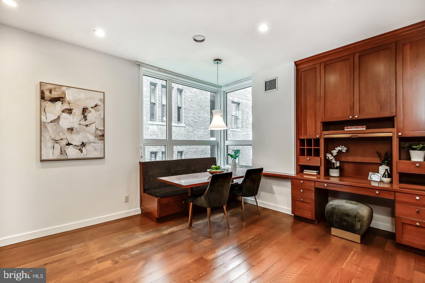 1820 Rittenhouse Square, Unit 1601 Philadelphia, PA 19103 - Photo 24 of 53 a view of a workspace with furniture and a kitchen