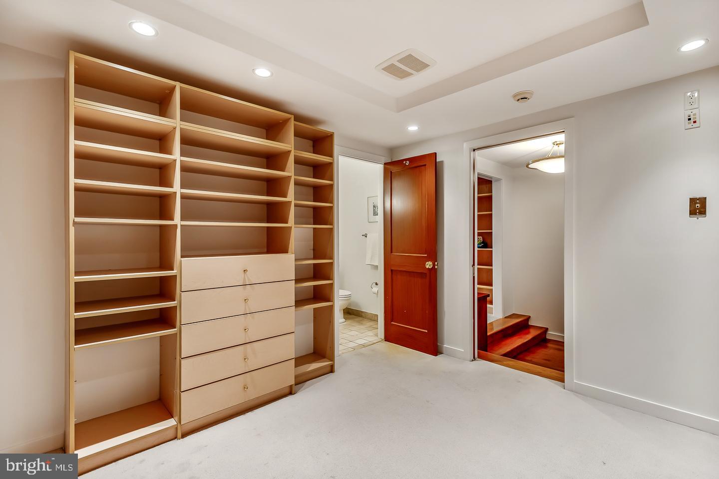 1820 Rittenhouse Square, Unit 1601 Philadelphia, PA 19103 - Photo 35 of 53 a view of an empty room with cabinet and mirrors
