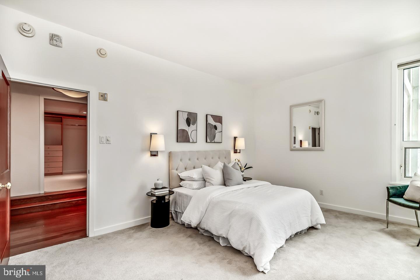 1820 Rittenhouse Square, Unit 1601 Philadelphia, PA 19103 - Photo 51 of 53 a bedroom with a bed and a window