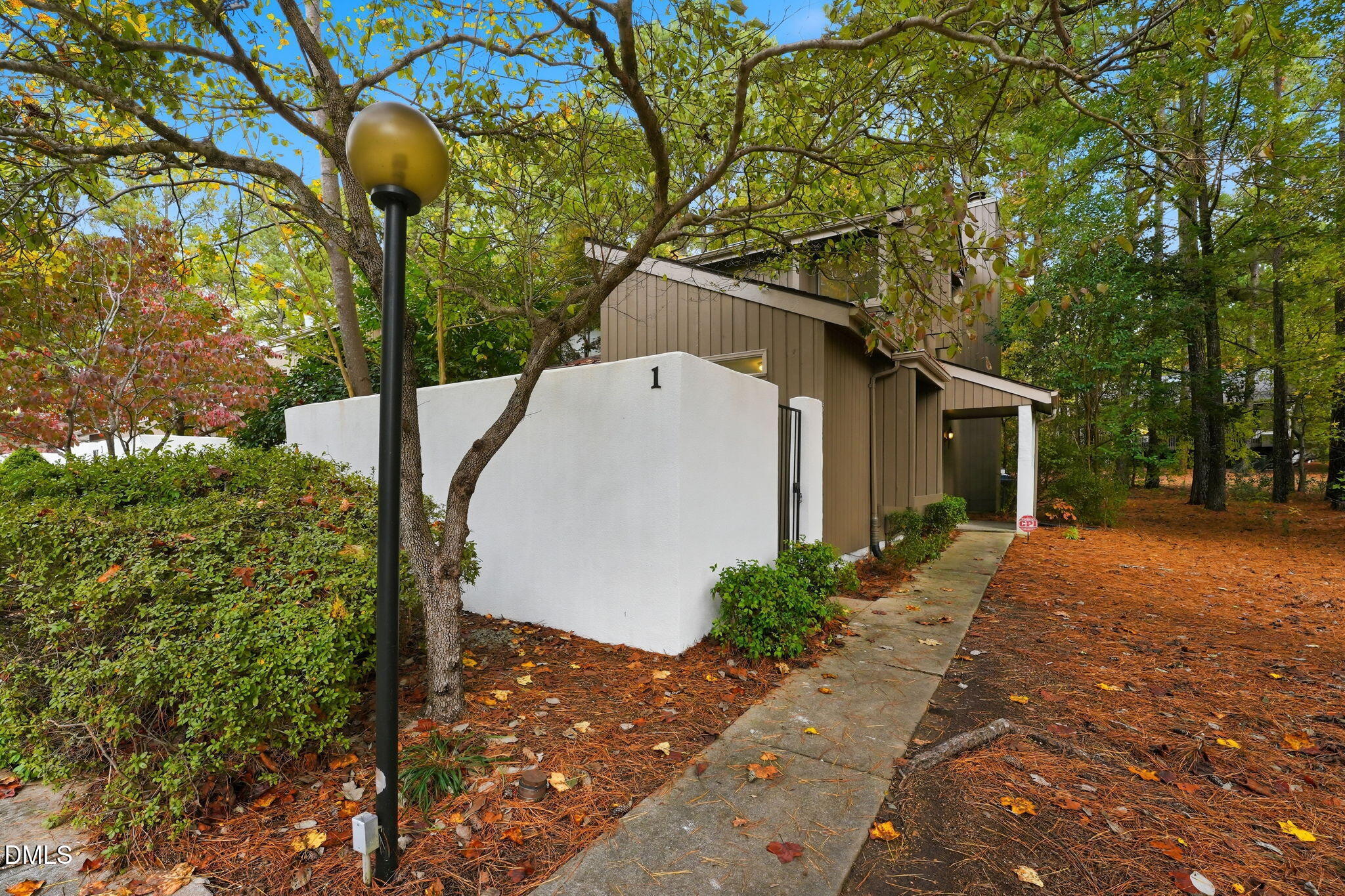 1 Vauxhall Place Chapel Hill, NC 27517 - Photo 1 of 25 a backyard of a house with lots of green space