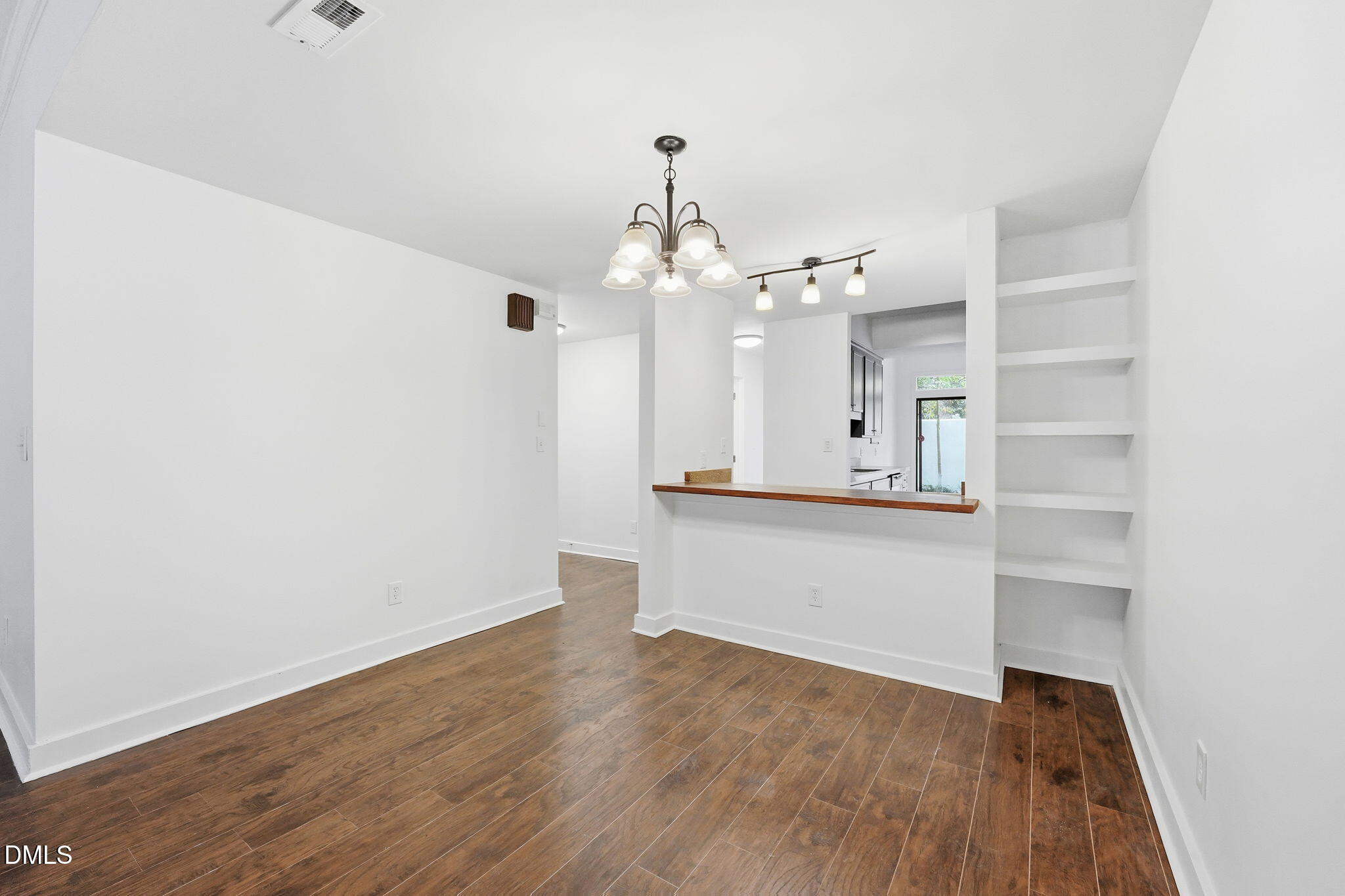 1 Vauxhall Place Chapel Hill, NC 27517 - Photo 14 of 25 wooden floor in an empty room with a mirror