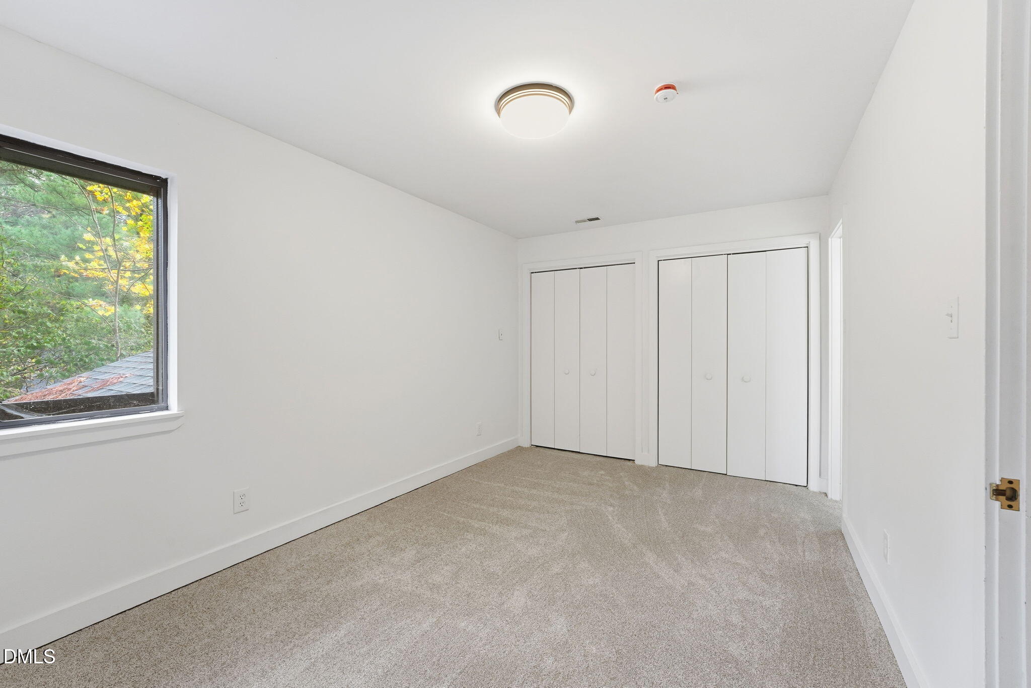 1 Vauxhall Place Chapel Hill, NC 27517 - Photo 15 of 25 a view of an empty room with a window
