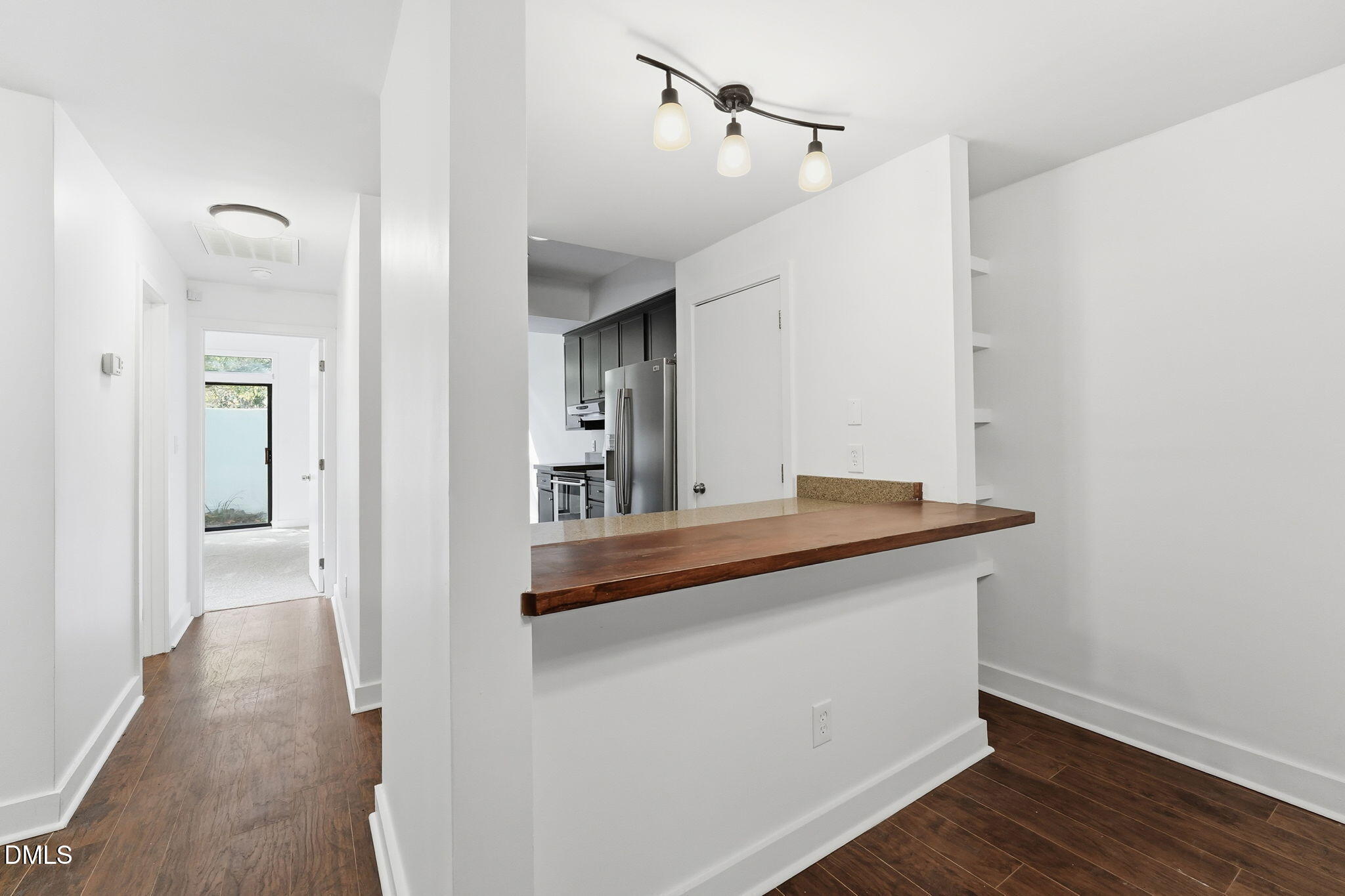 1 Vauxhall Place Chapel Hill, NC 27517 - Photo 4 of 25 a hallway view with hardwood floor