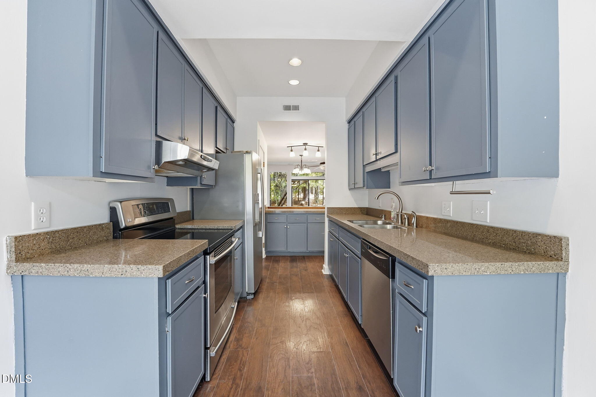 1 Vauxhall Place Chapel Hill, NC 27517 - Photo 7 of 25 a kitchen with a stove sink and cabinets
