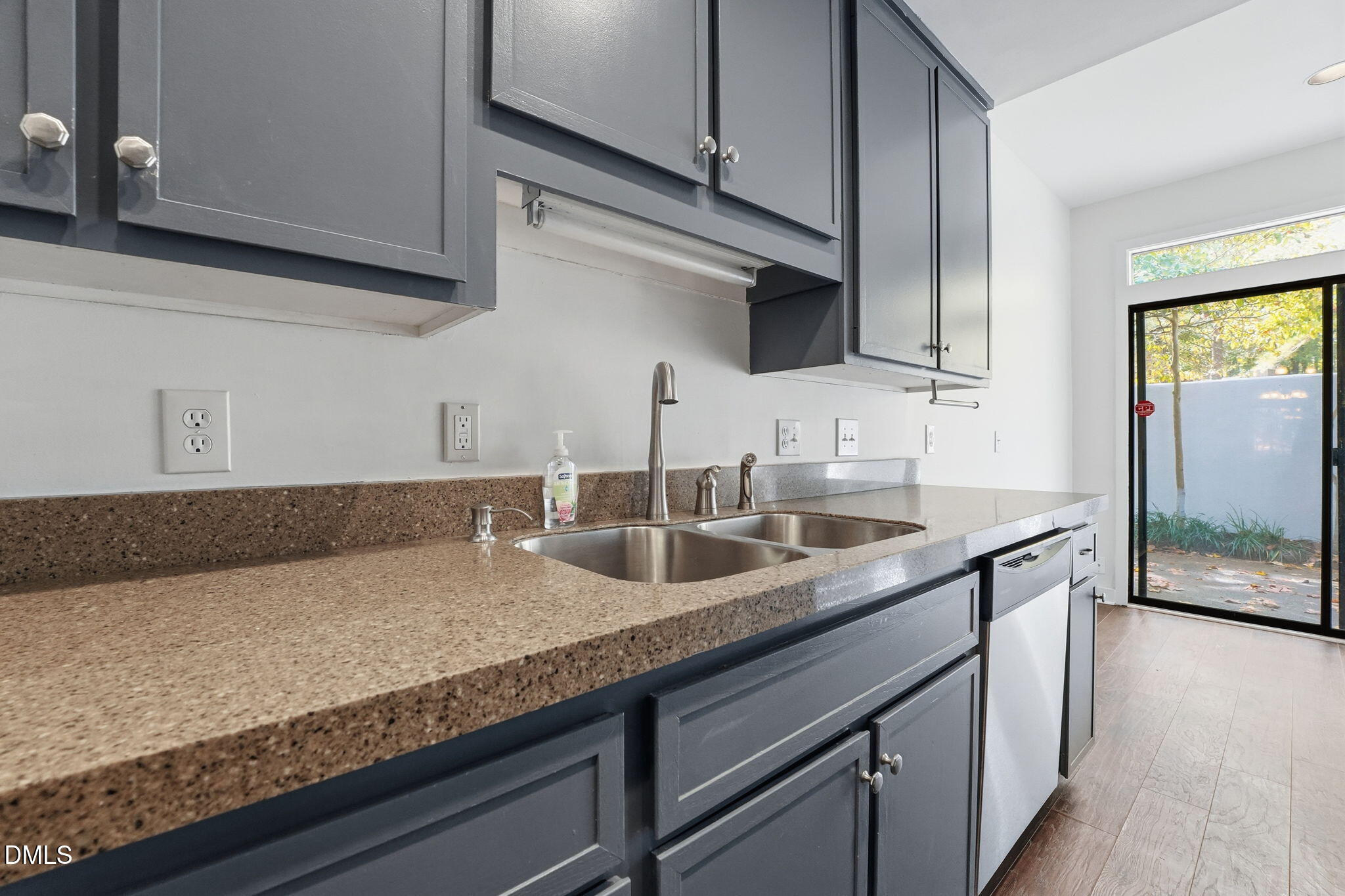1 Vauxhall Place Chapel Hill, NC 27517 - Photo 8 of 25 a kitchen with granite countertop stainless steel appliances a sink and cabinets
