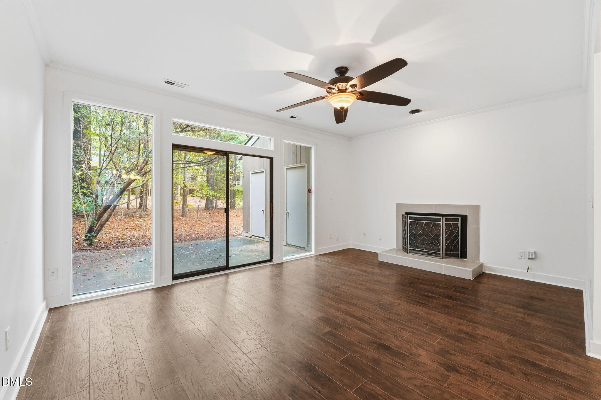 1 Vauxhall Place Chapel Hill, NC 27517 - Photo 10 of 25 a view of an empty room with wooden floor and a window