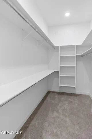 a bathroom with a double vanity sink toilet and a mirror