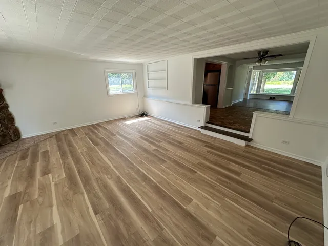a view of an empty room and window