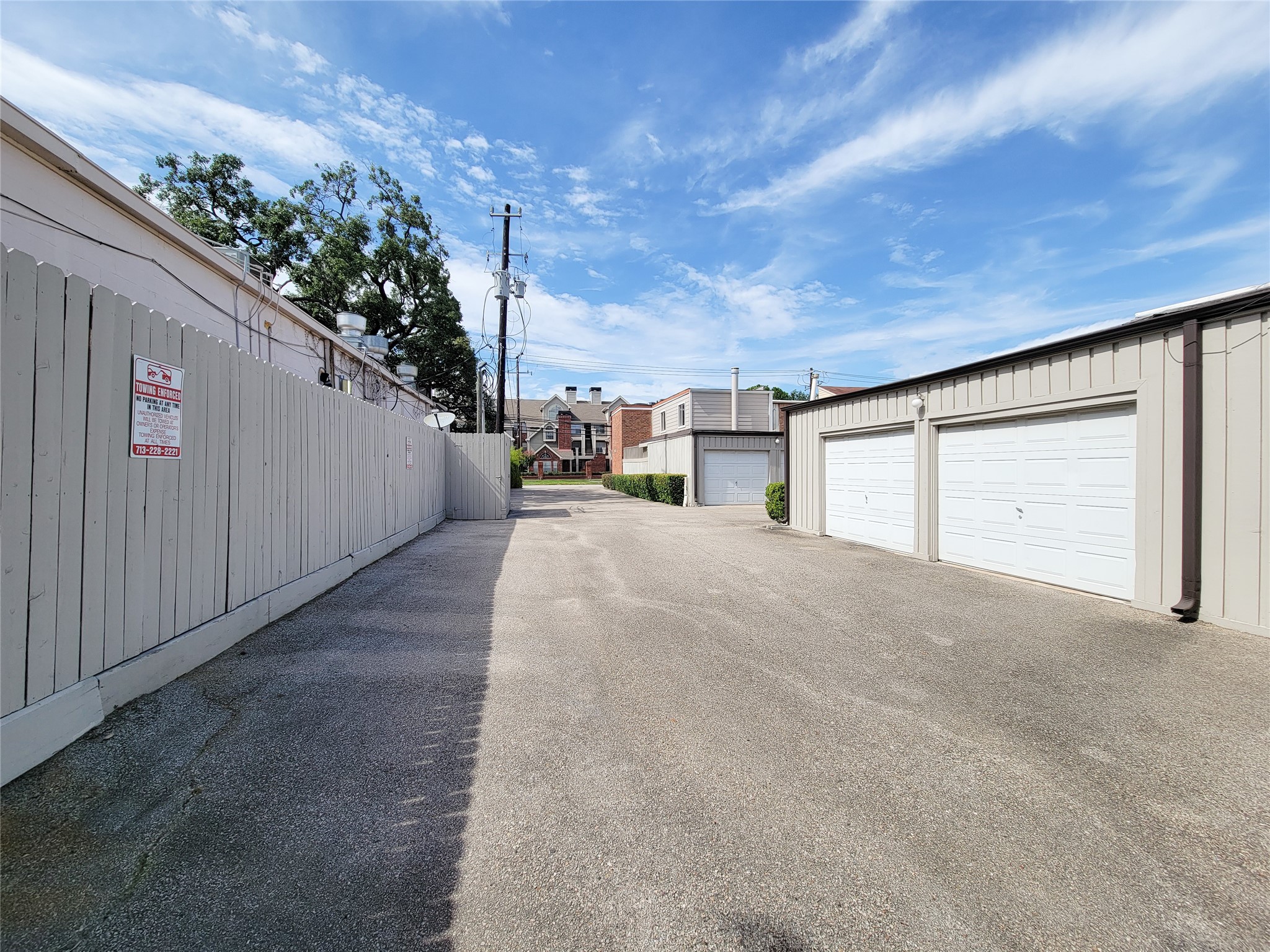 2243 West Alabama Street, Unit B Houston, TX 77098 - Photo 40 of 44 a view of a road with a building in the background