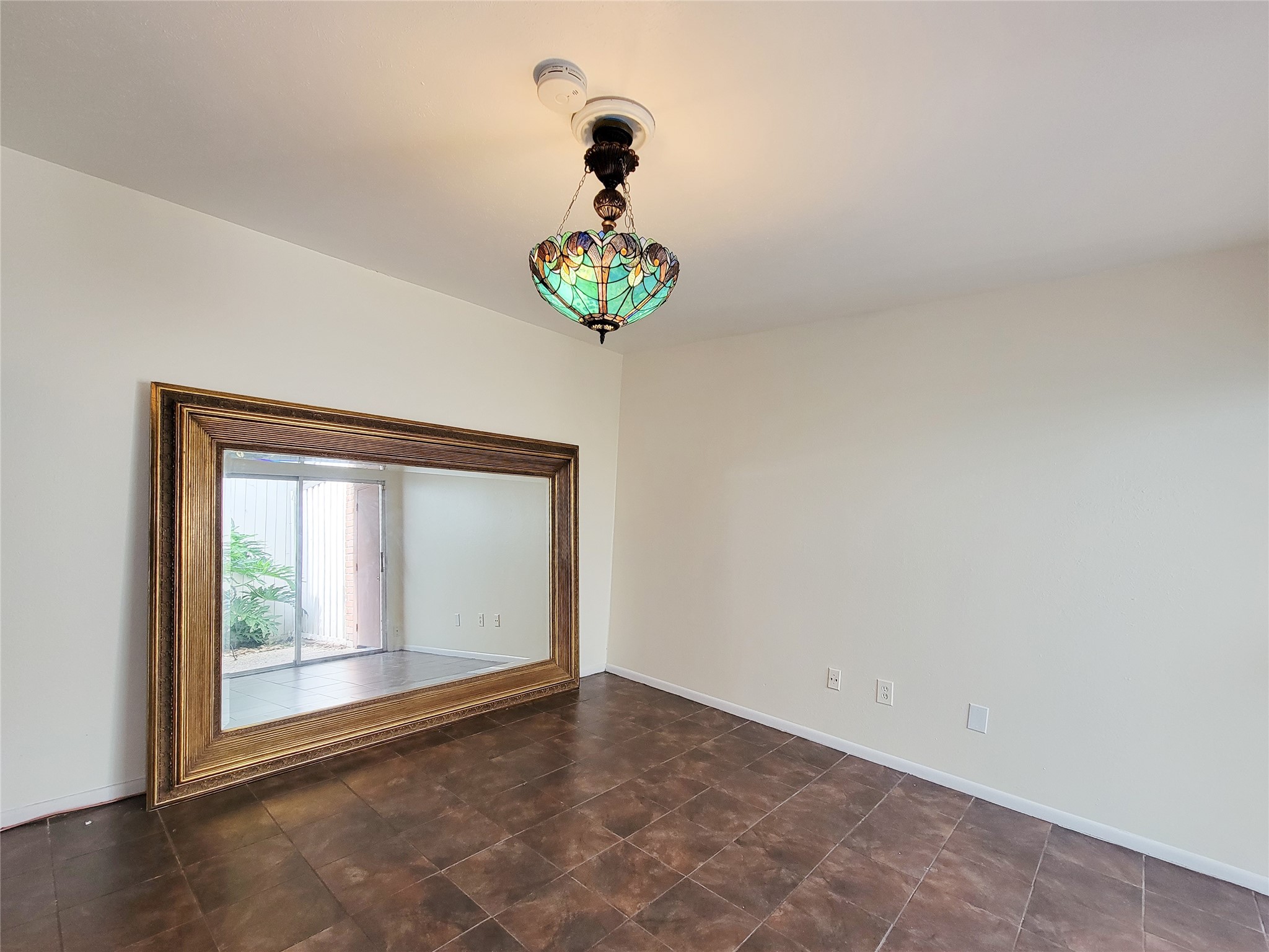 2243 West Alabama Street, Unit B Houston, TX 77098 - Photo 6 of 44 a view of an empty room with a window