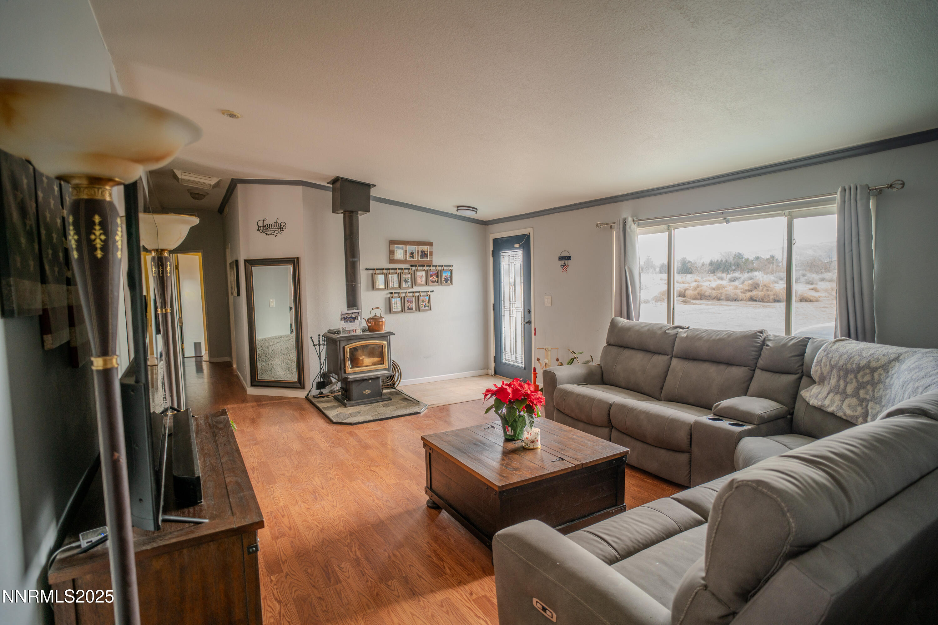3250 4th Street Silver Springs, NV 89429 - Photo 39 of 73 a living room with furniture and a large window