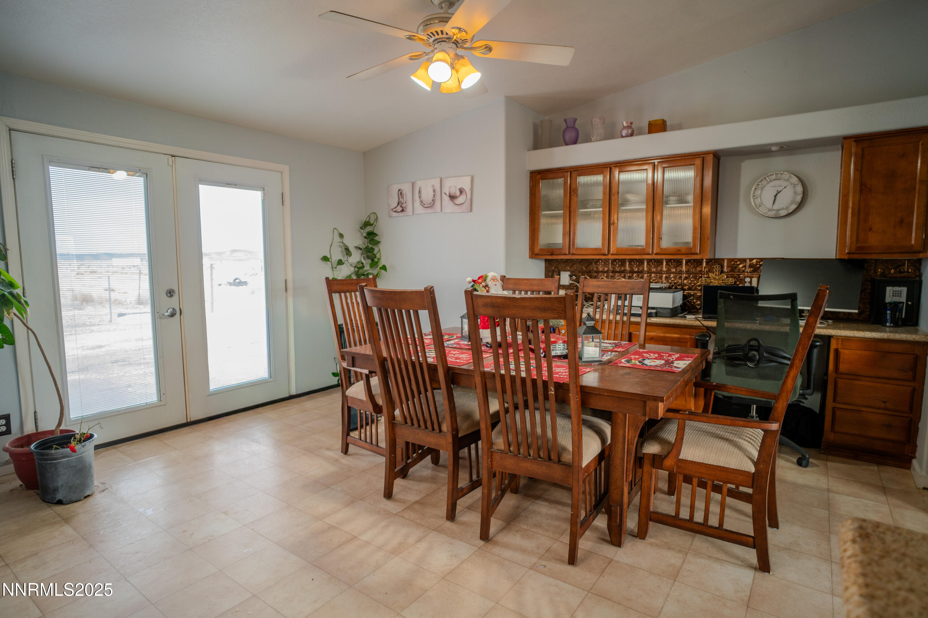 3250 4th Street Silver Springs, NV 89429 - Photo 46 of 73 a view of a dining room with furniture and chandelier