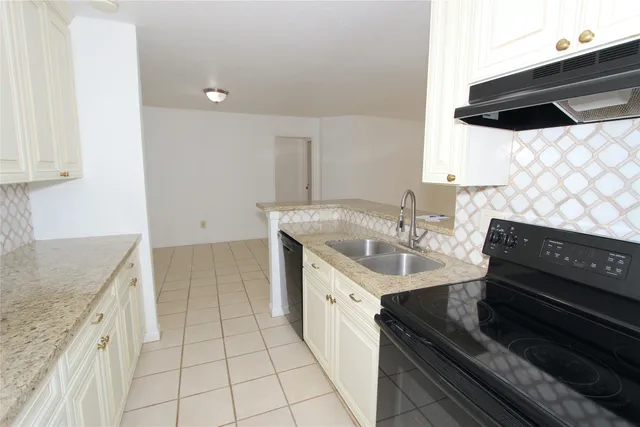 a bathroom with a sink a toilet and a bathtub