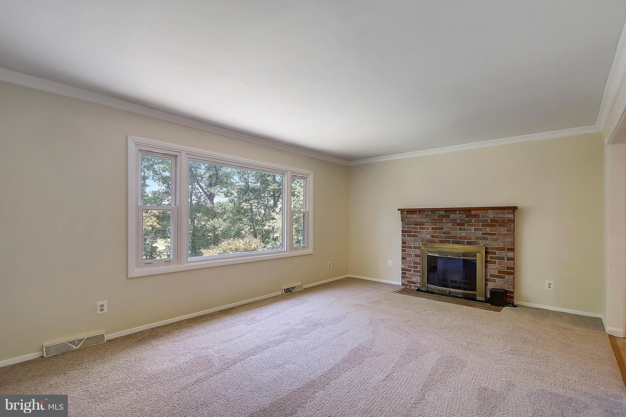 23825 Stringtown Road Clarksburg, MD 20871 - Photo 4 of 29 Cozy Living Room w/ Fire Place