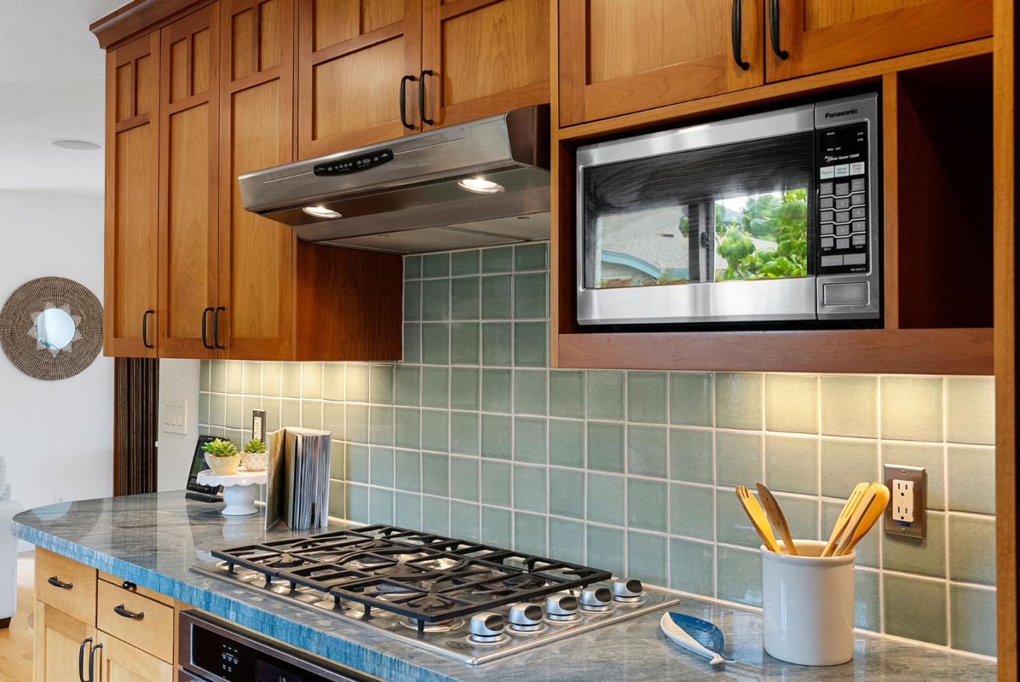 1817 Via Pacifica Aptos, CA 95003 - Photo 11 of 40 a kitchen with a stove and a microwave