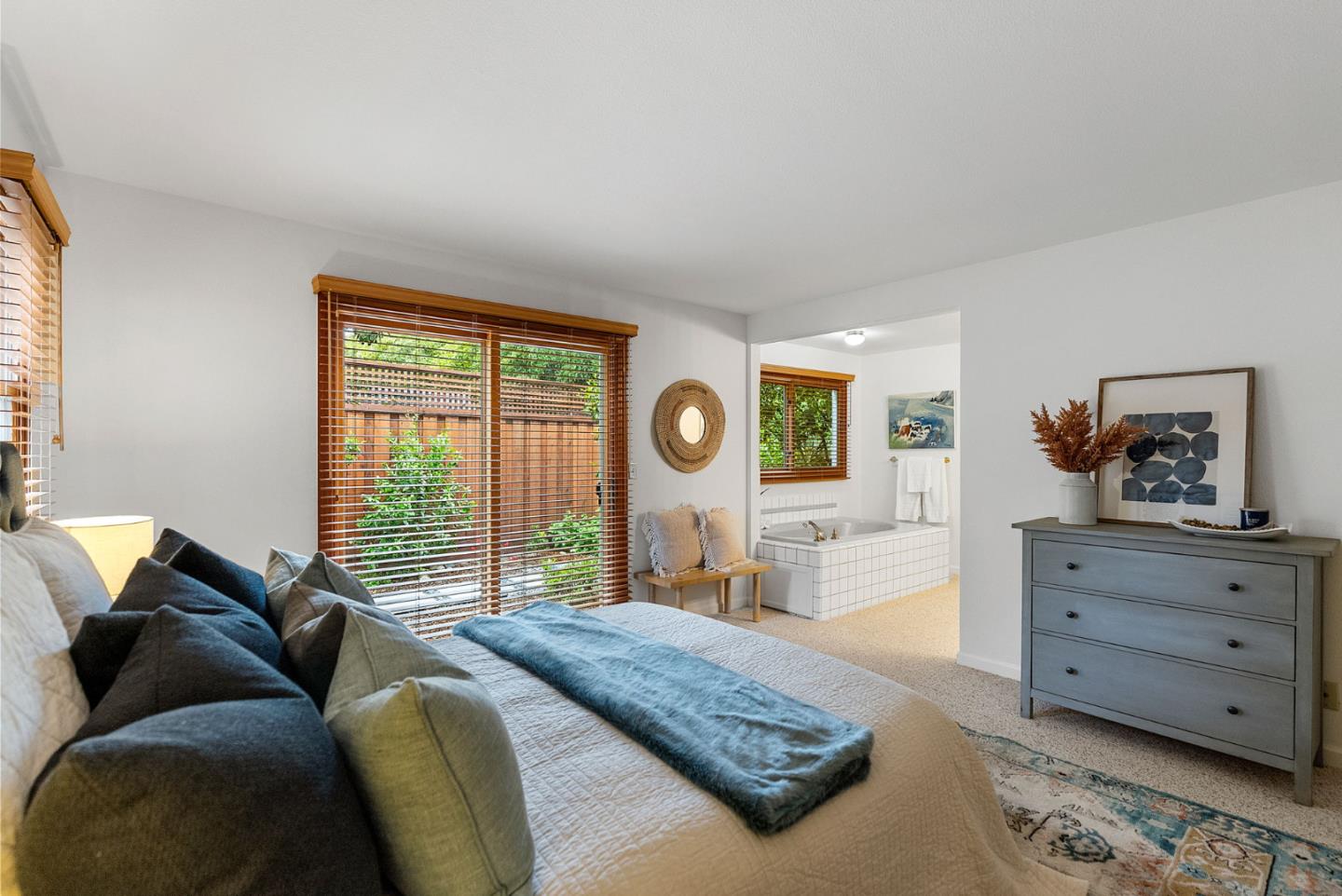 1817 Via Pacifica Aptos, CA 95003 - Photo 15 of 40 a bedroom with a bed and wooden floor