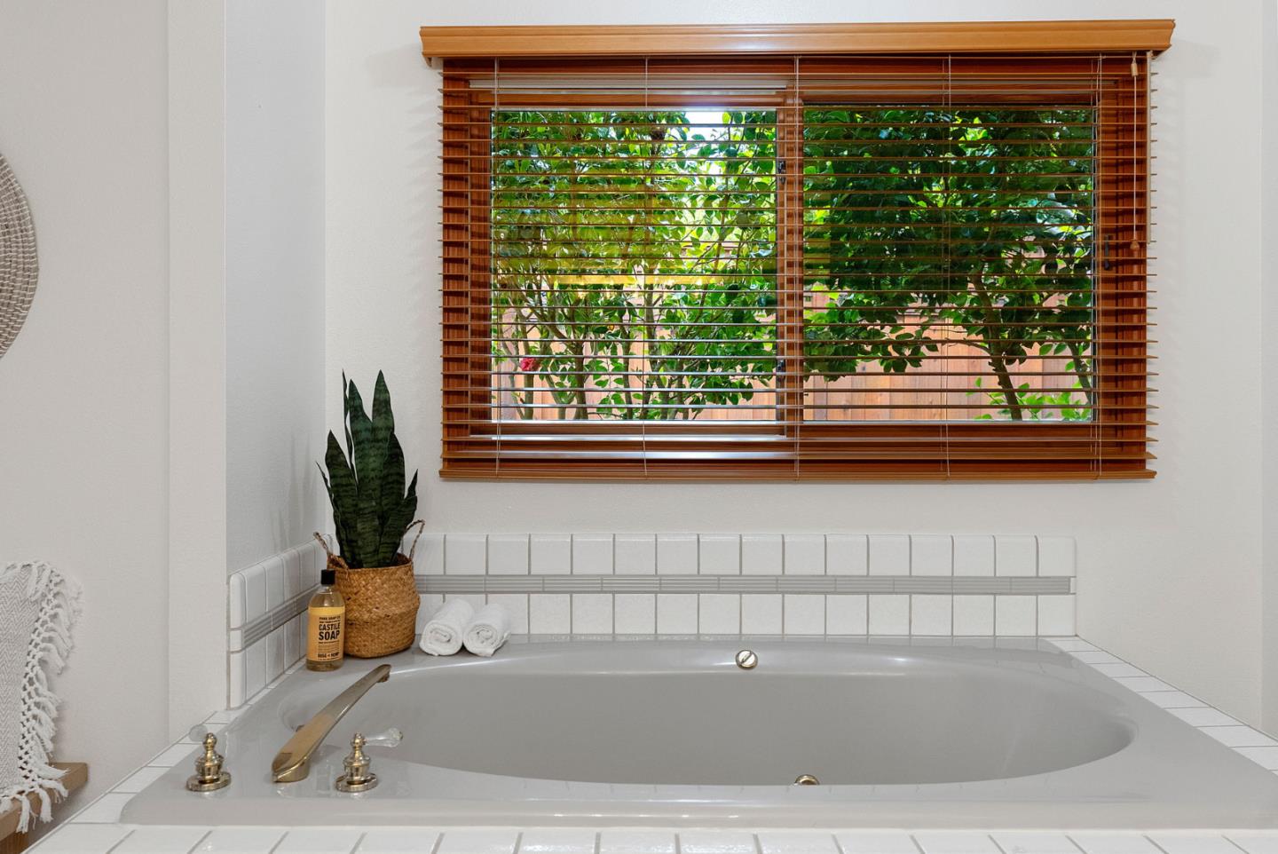 1817 Via Pacifica Aptos, CA 95003 - Photo 17 of 40 a bathroom with a bathtub and window