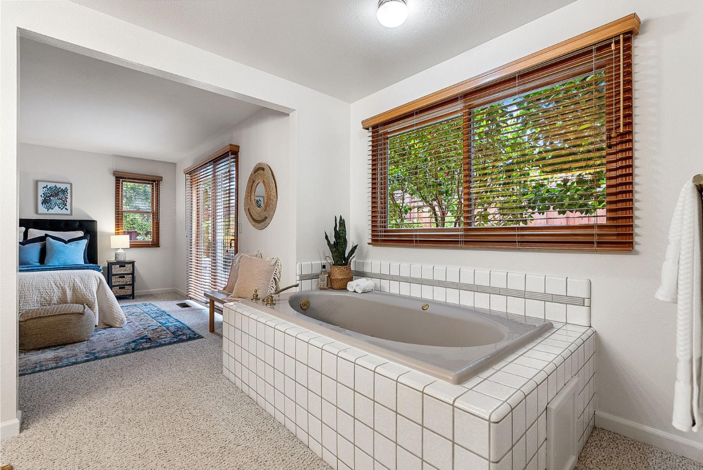 1817 Via Pacifica Aptos, CA 95003 - Photo 18 of 40 a spacious bathroom with a tub and a large window