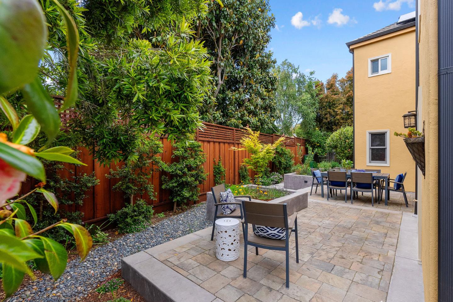 1817 Via Pacifica Aptos, CA 95003 - Photo 27 of 40 a view of a patio with table and chairs and potted plants