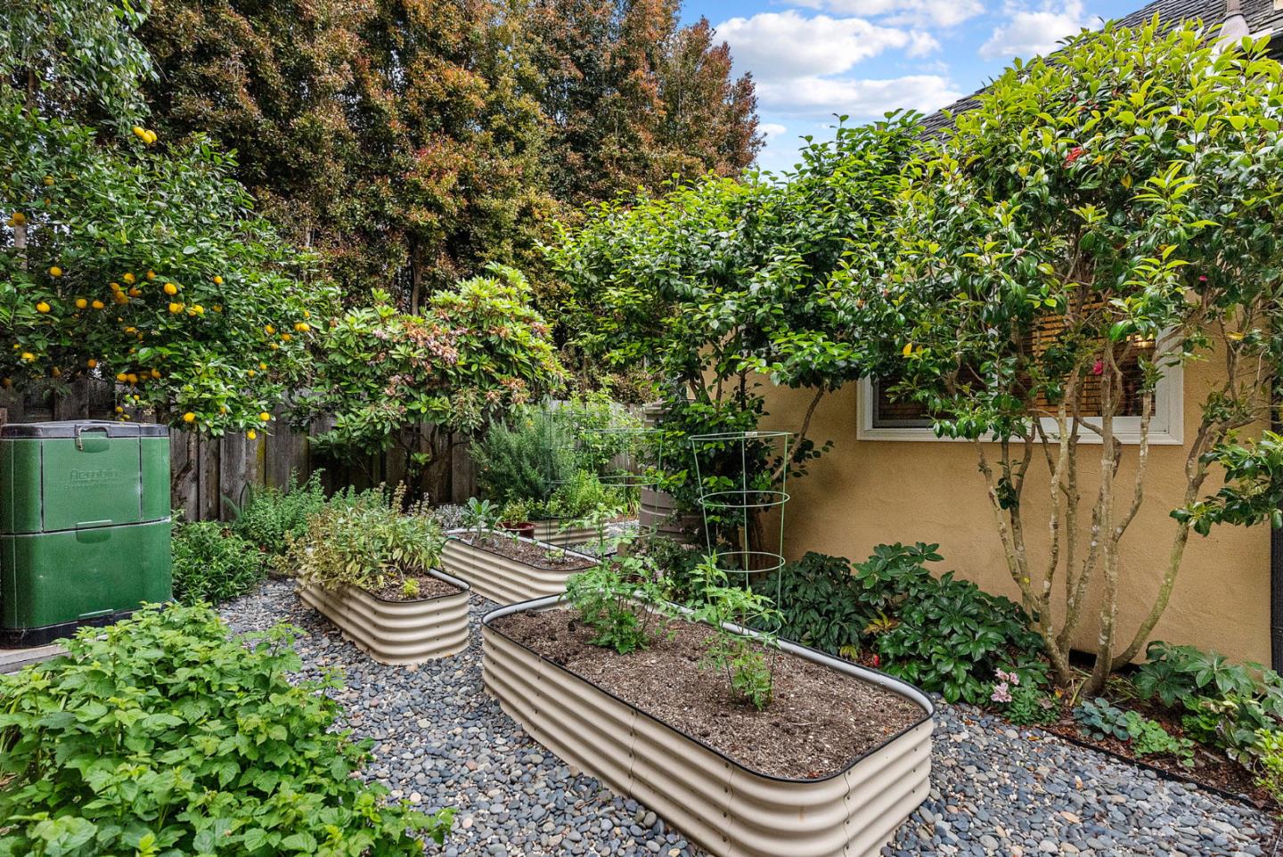 1817 Via Pacifica Aptos, CA 95003 - Photo 29 of 40 a view of a backyard with sitting area and garden