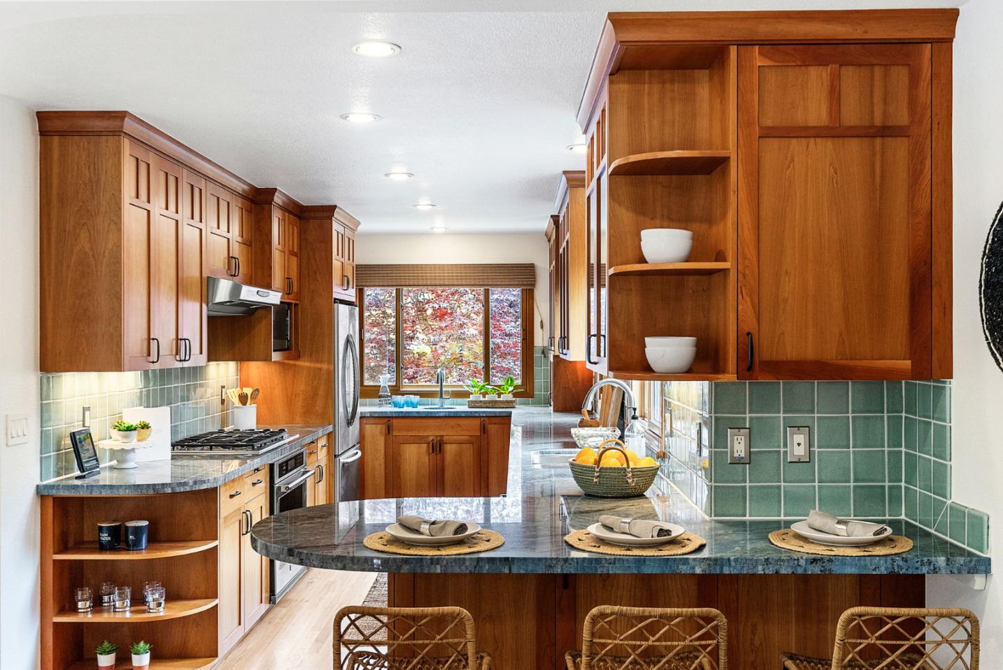 1817 Via Pacifica Aptos, CA 95003 - Photo 9 of 40 a kitchen with a refrigerator and a stove