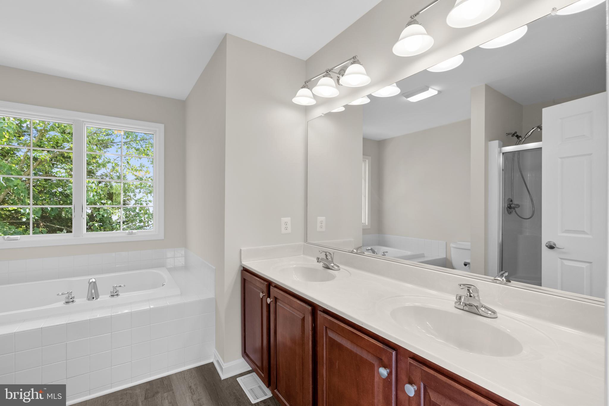 1003 Bexhill Drive Frederick, MD 21702 - Photo 23 of 38 Owner's bath with walk-in shower and soaking tub