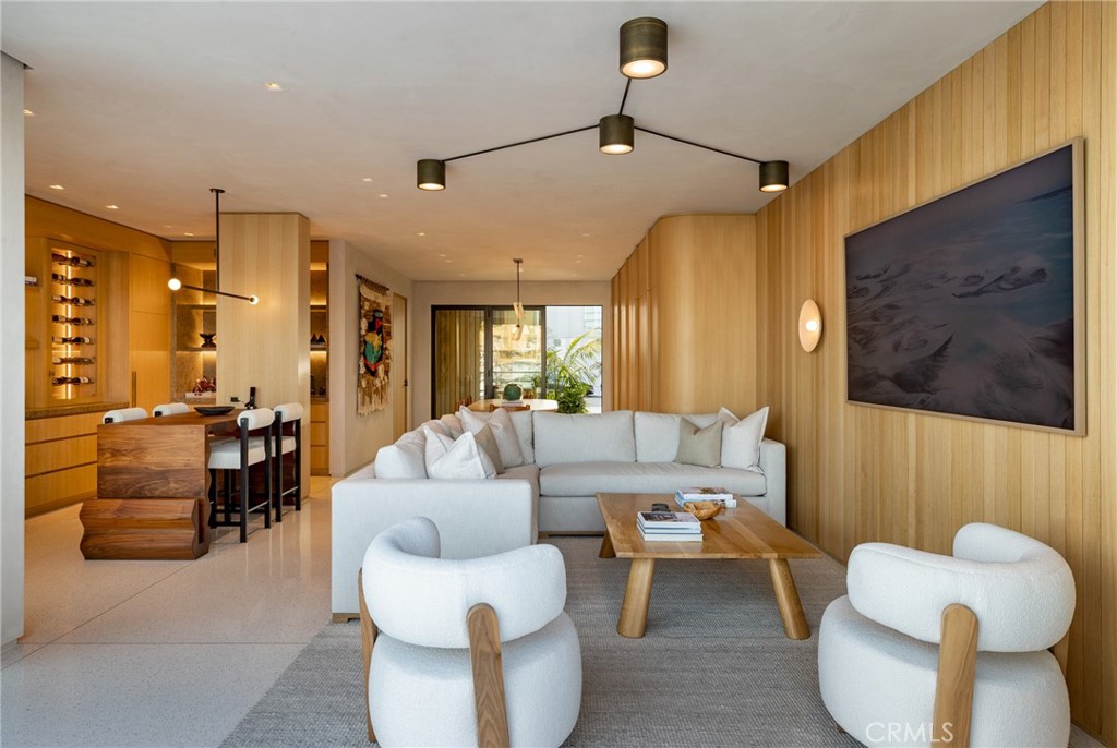 2910 Lafayette Avenue Newport Beach, CA 92663 - Photo 53 of 60 a living room with furniture and a flat screen tv