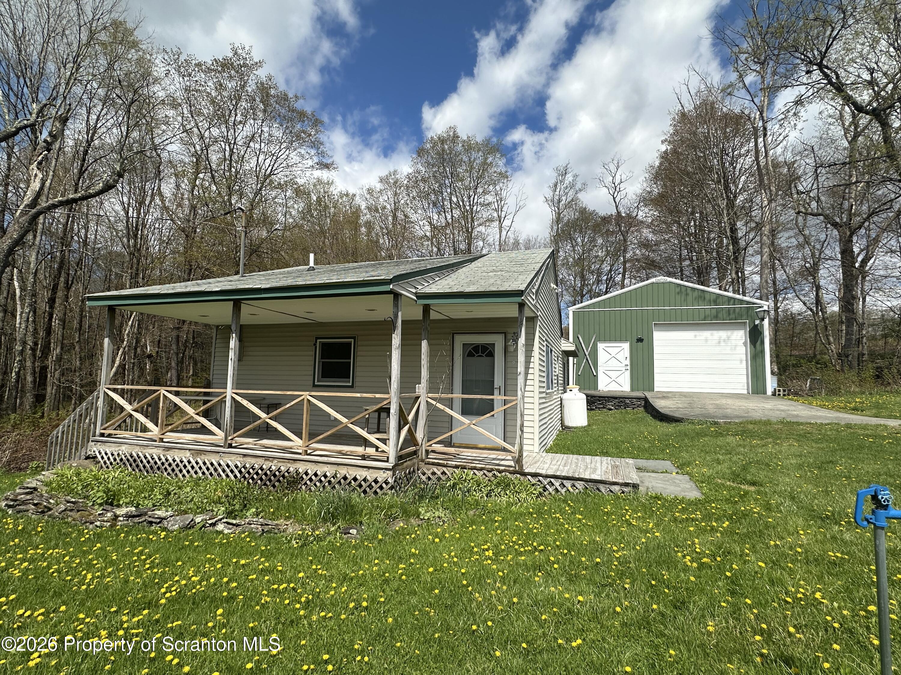 377 Shafer Road Thompson, PA 18465 - Photo 4 of 17 Front with barn