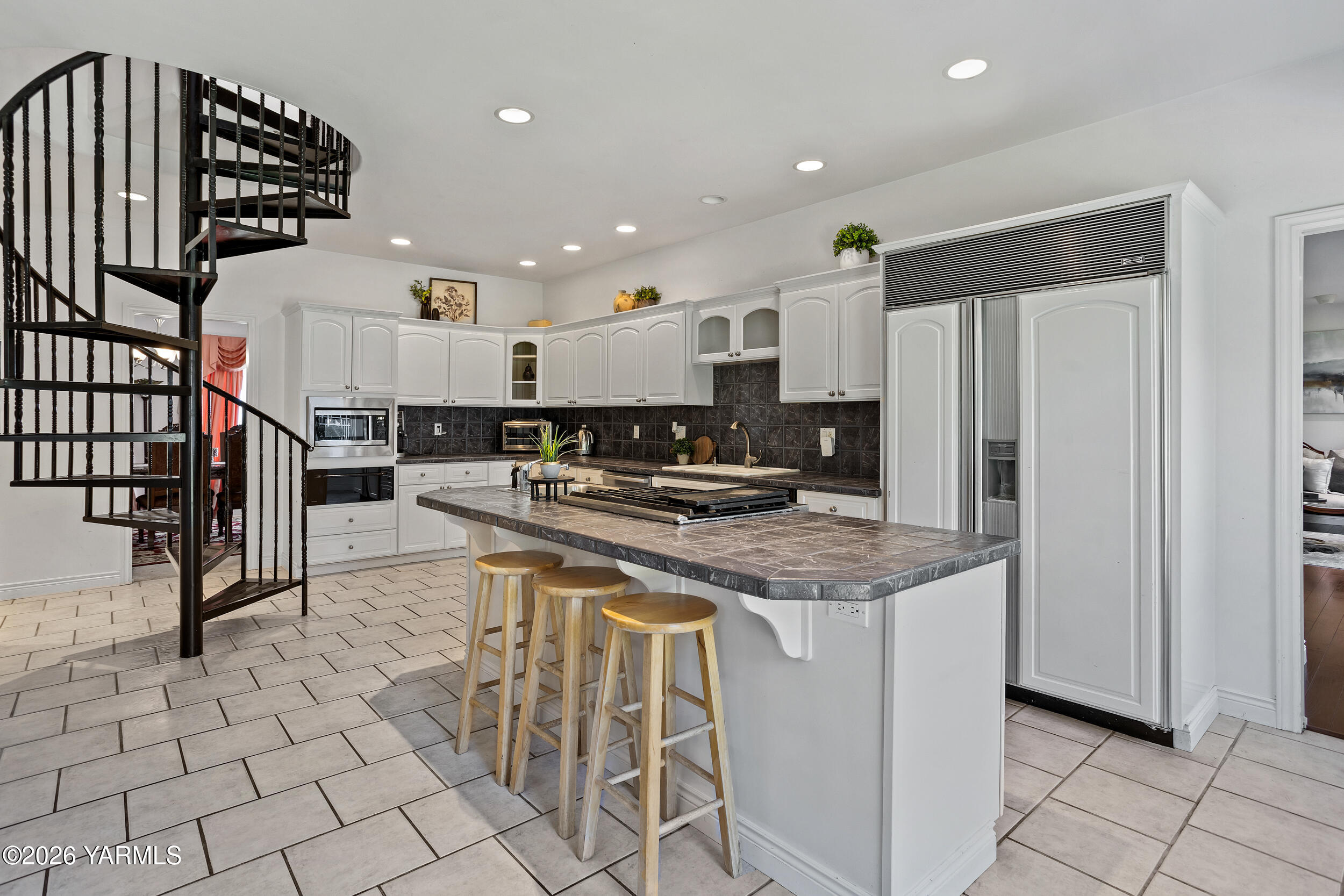 14801 Summitview Ext Road Yakima, WA 98908 - Photo 11 of 80 a kitchen with stainless steel appliances granite countertop a stove a sink and a refrigerator