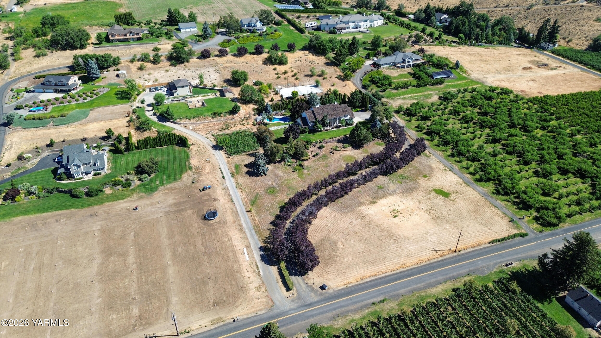 14801 Summitview Ext Road Yakima, WA 98908 - Photo 20 of 80 an aerial view of a house with a yard and lake view in back