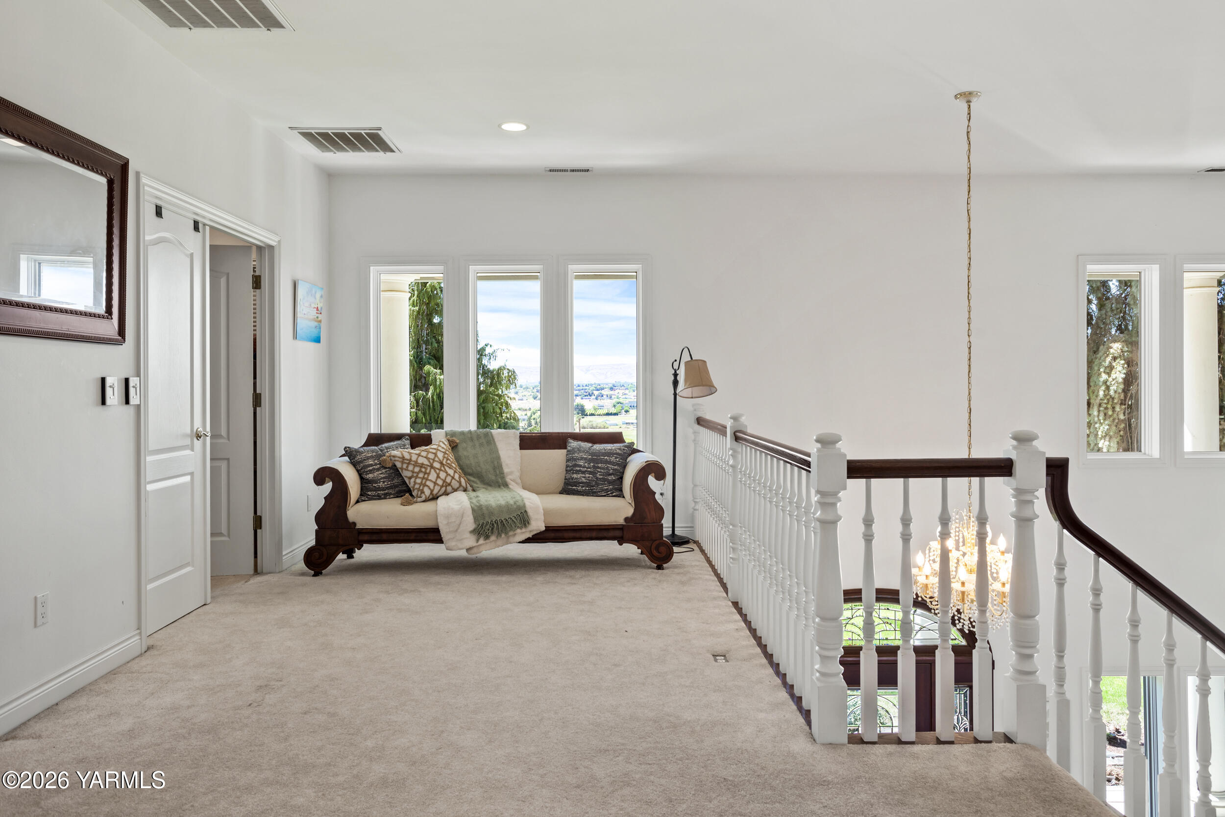 14801 Summitview Ext Road Yakima, WA 98908 - Photo 67 of 80 a living room with furniture and white walls next to a window