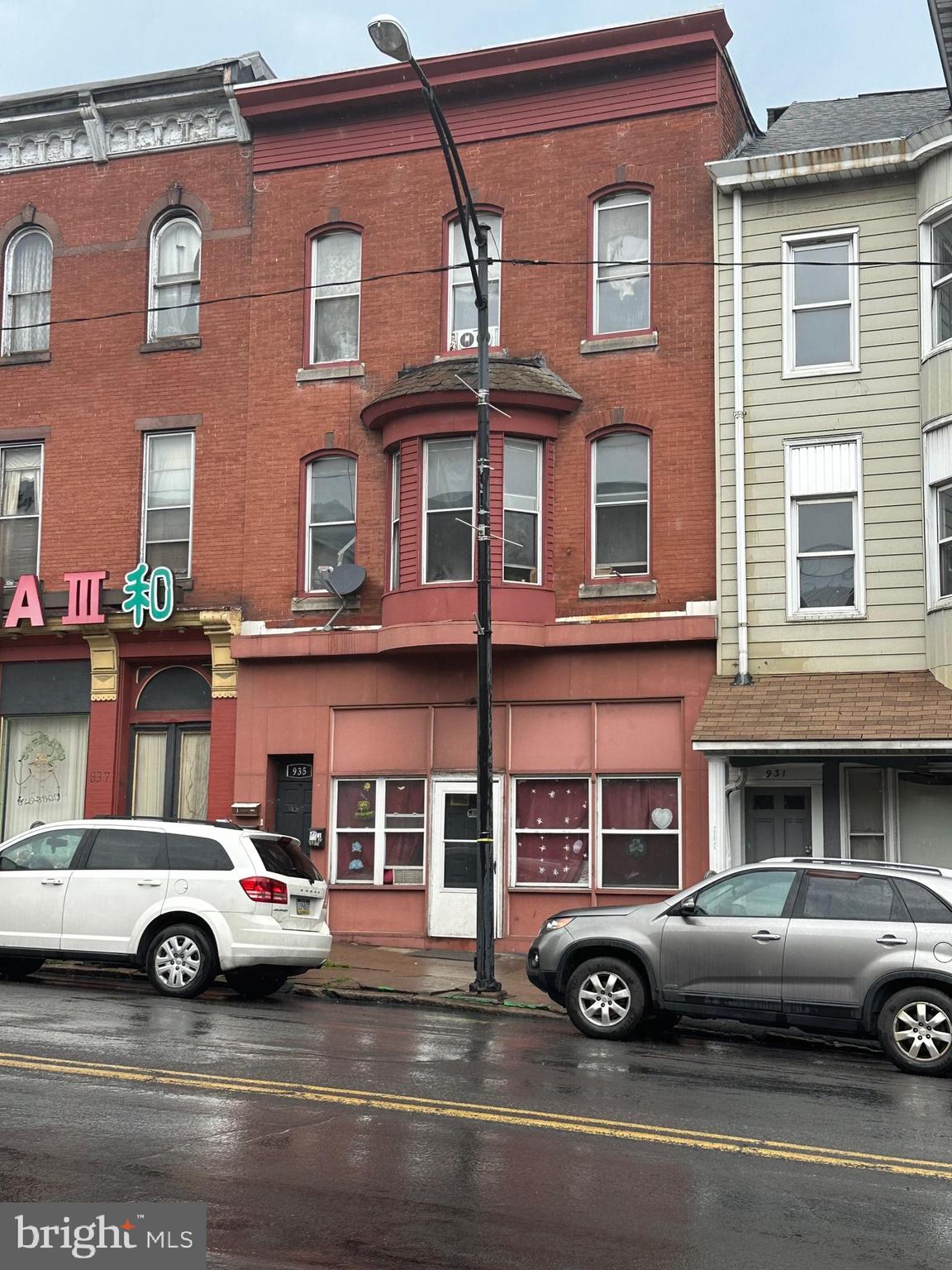 a car parked in front of a building