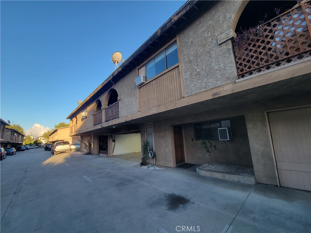 15005 Indiana Paramount, CA 90723 - Photo 7 of 7 a view of a house with a street