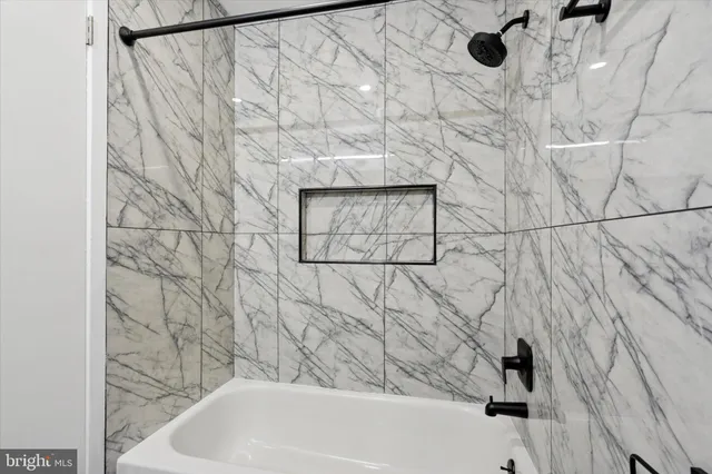 a bathroom with a bathtub