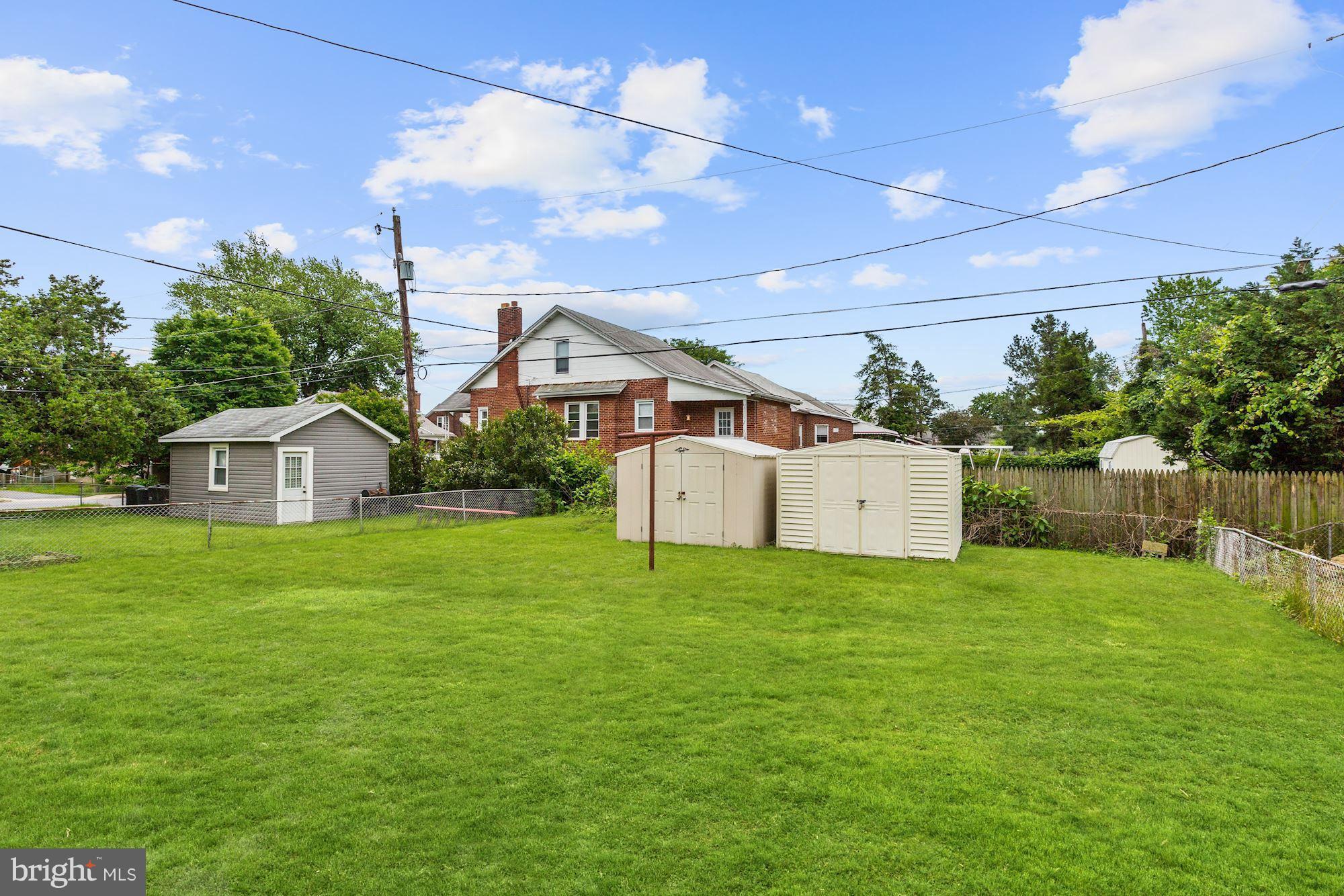 1305 Sulphur Spring Road Baltimore, MD 21227 - Photo 22 of 23 a house view with a garden space