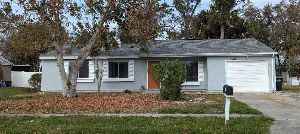 4440 Mongite Road North Port, FL 34287 - Photo 1 of 1 a front view of house with a garden
