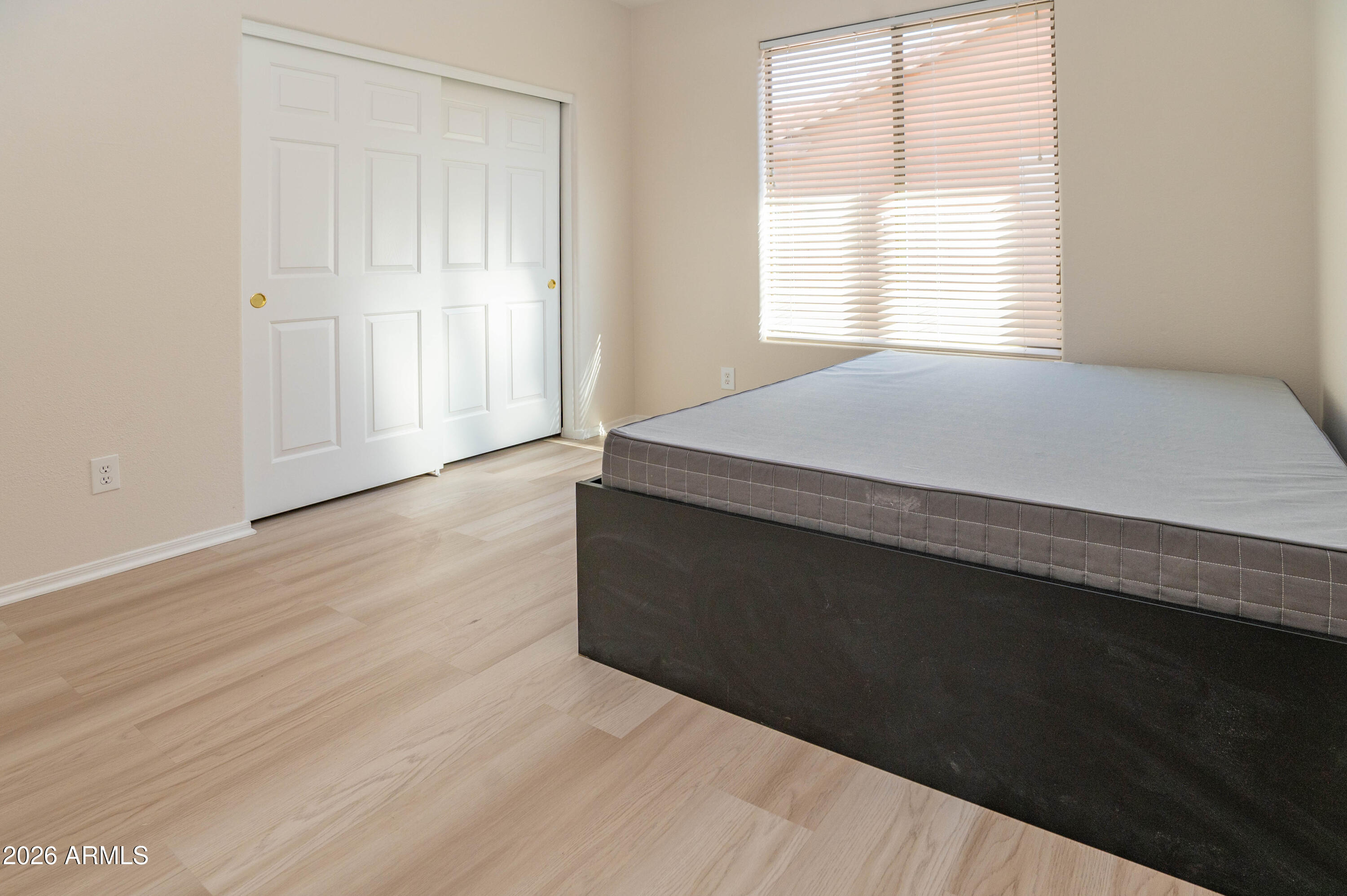 45633 West Mountain View Road Maricopa, AZ 85139 - Photo 54 of 78 a room with a bed and a window