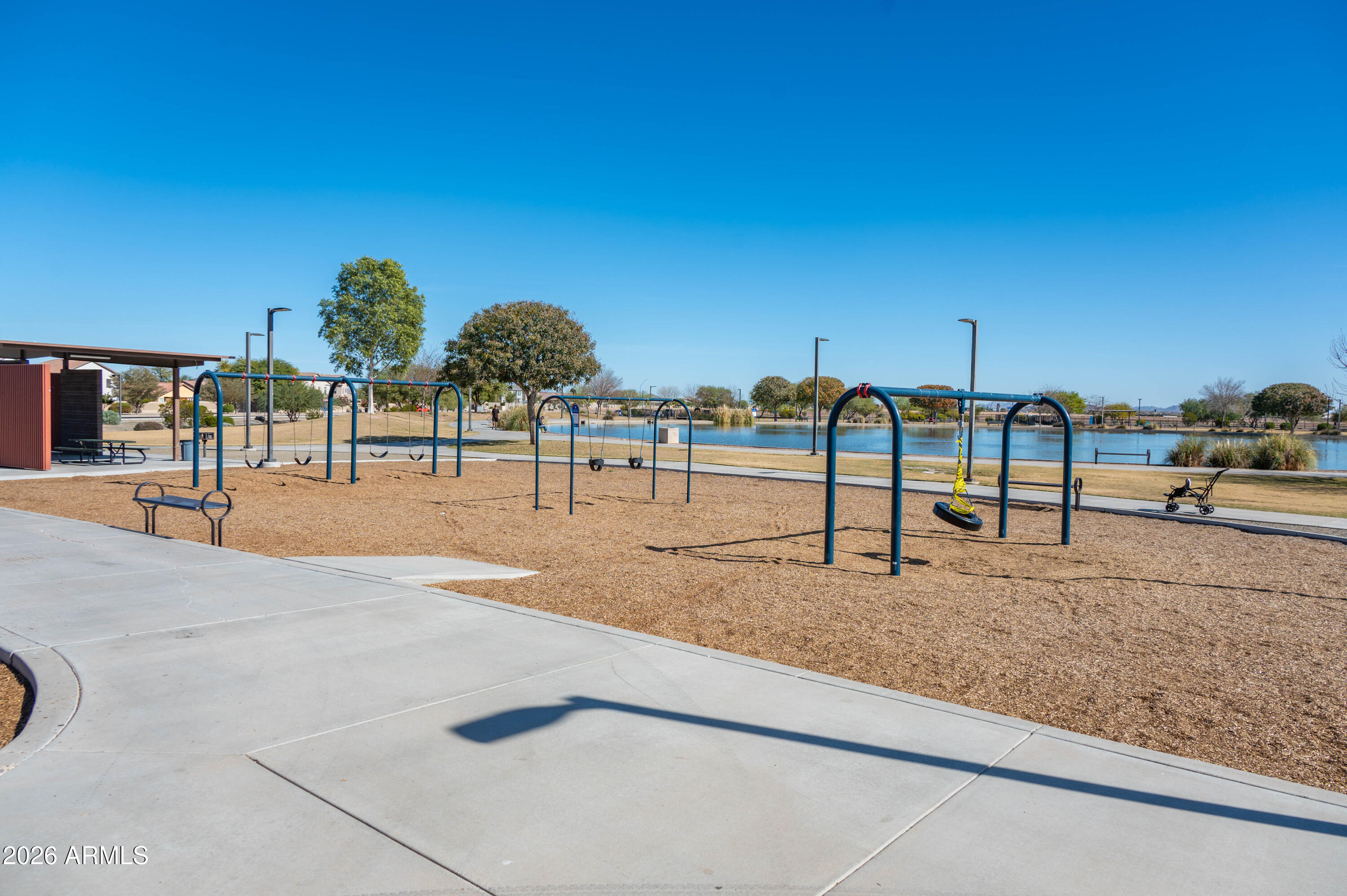 45633 West Mountain View Road Maricopa, AZ 85139 - Photo 77 of 78 a view of a park with swings