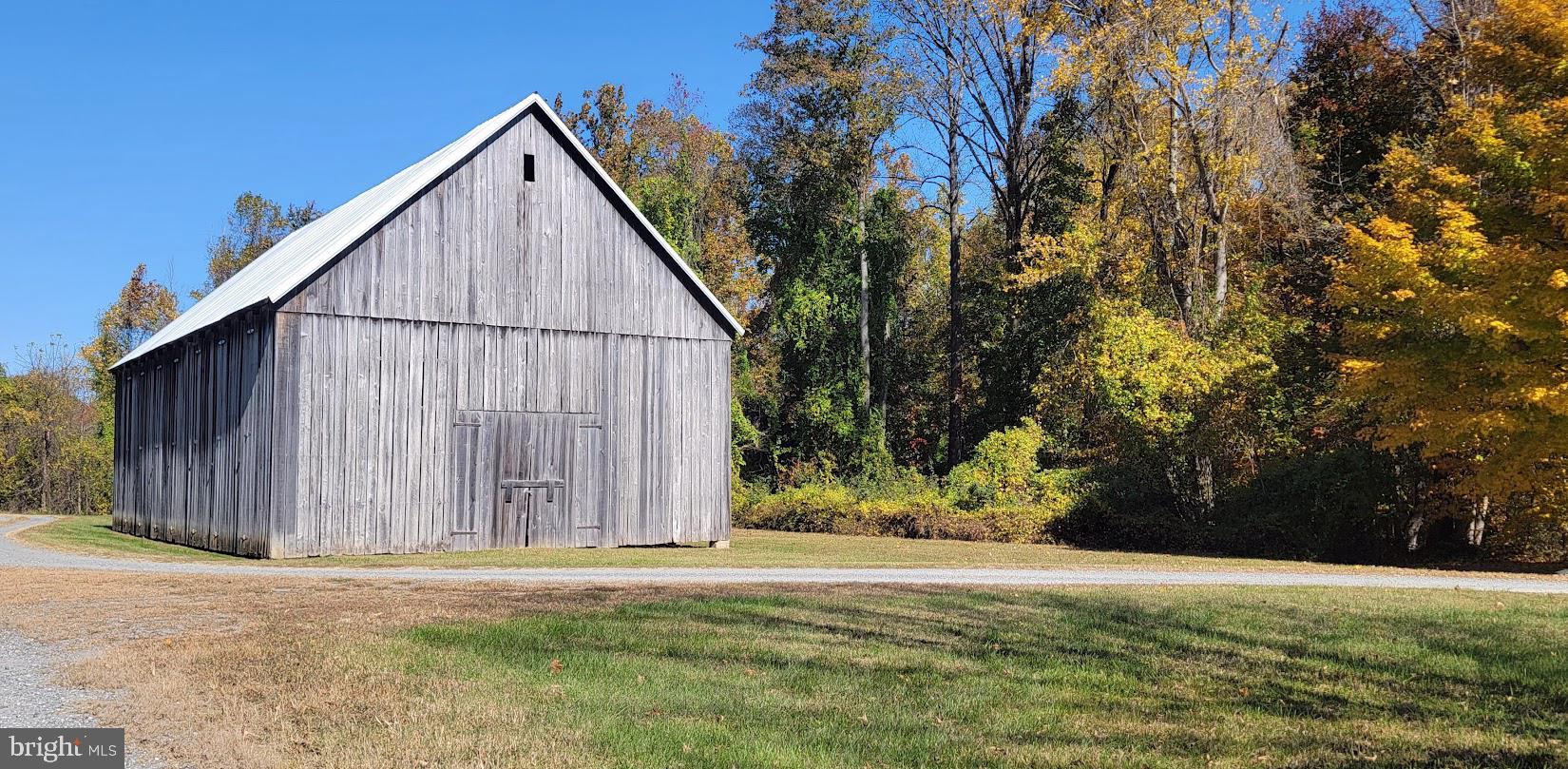 Magruders Ferry Road, Unit PARCEL C Brandywine, MD 20613 - Photo 24 of 39 a view of backyard of house with wooden fence