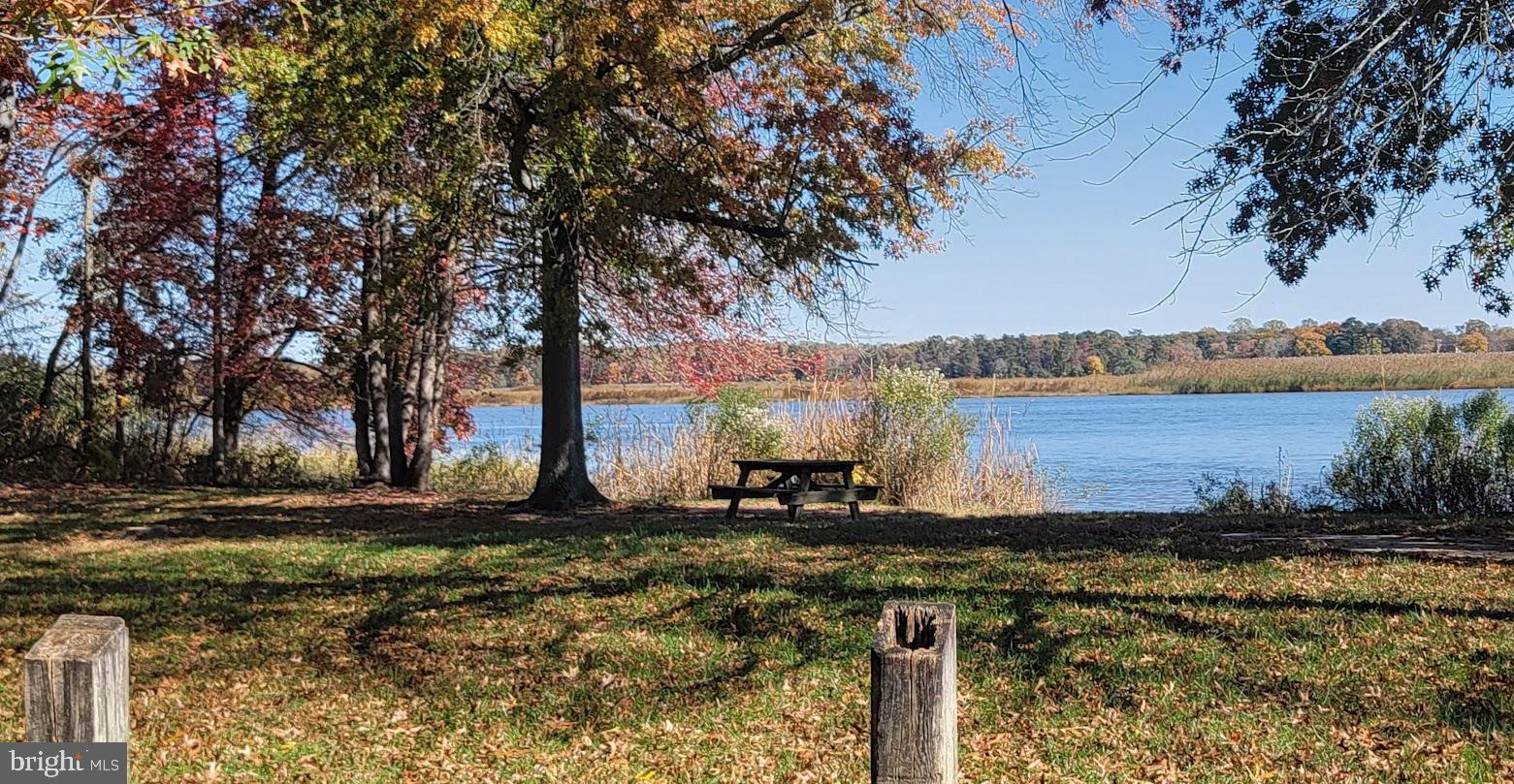 Magruders Ferry Road, Unit PARCEL C Brandywine, MD 20613 - Photo 28 of 39 a front view of a house with a yard