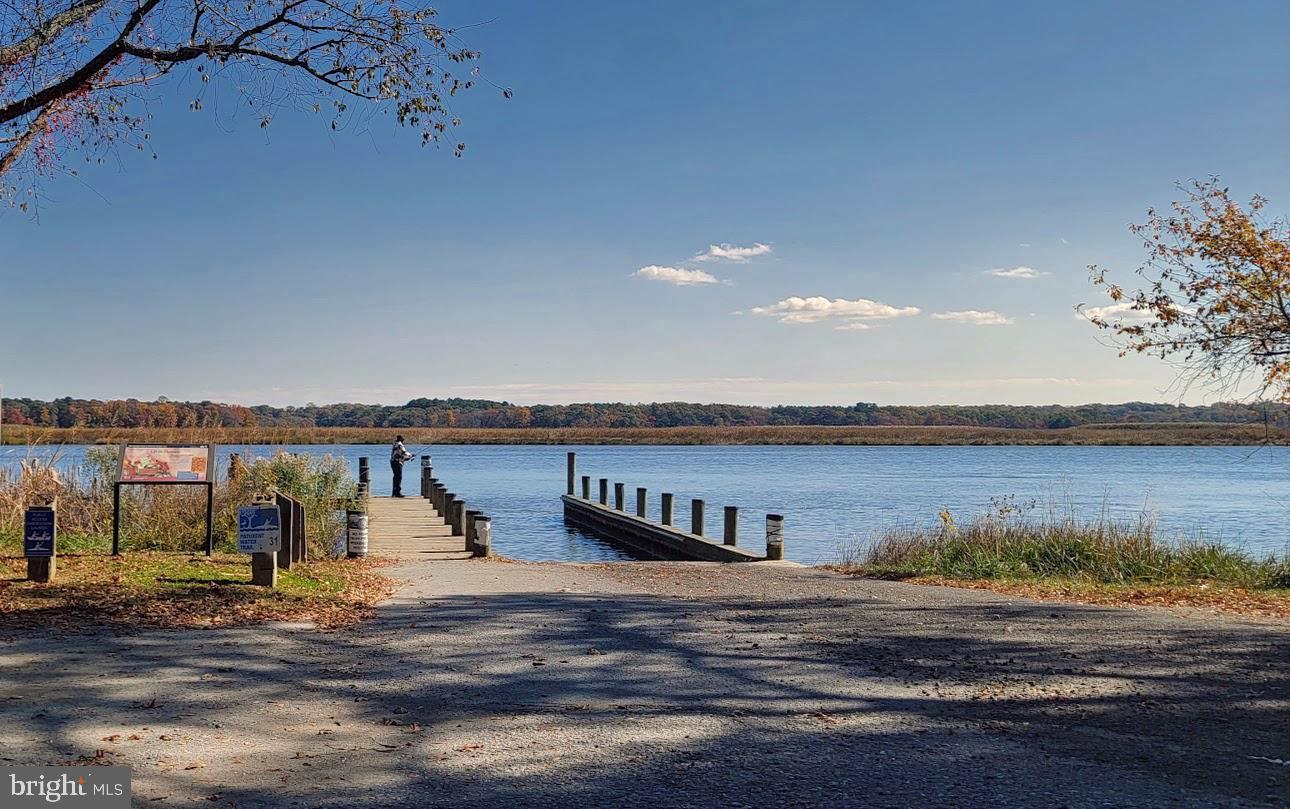 Magruders Ferry Road, Unit PARCEL C Brandywine, MD 20613 - Photo 29 of 39 a view of a swimming pool with an outdoor space and seating area