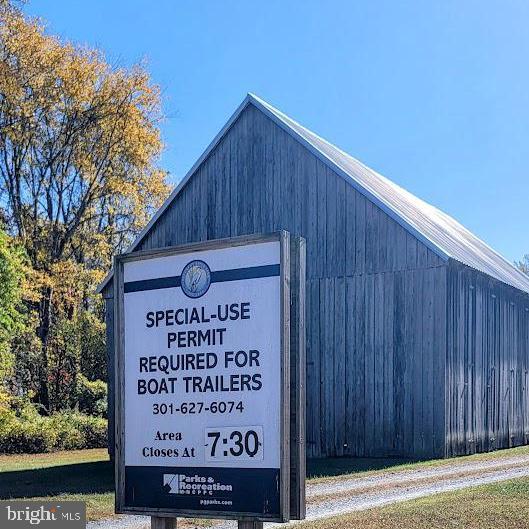Magruders Ferry Road, Unit PARCEL C Brandywine, MD 20613 - Photo 31 of 39 a sign on the wooden wall