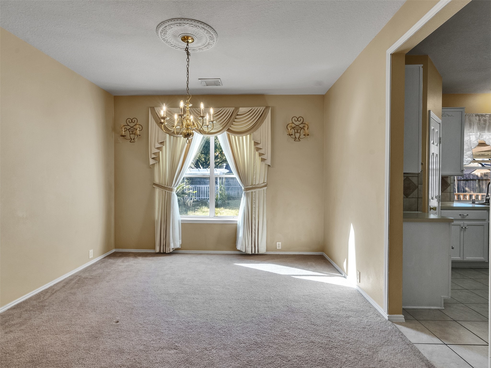 4815 Cottage Stone Lane Katy, TX 77449 - Photo 15 of 48 a view of empty room with window and outdoor space