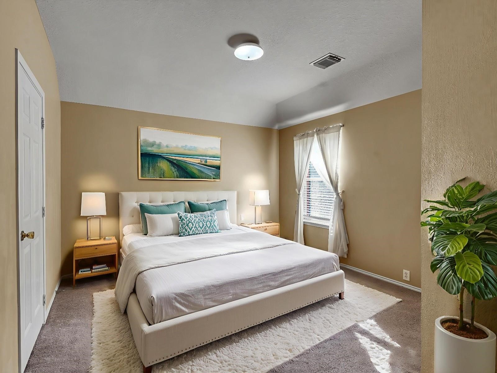 4815 Cottage Stone Lane Katy, TX 77449 - Photo 35 of 48 a bedroom with a bed and a potted plant