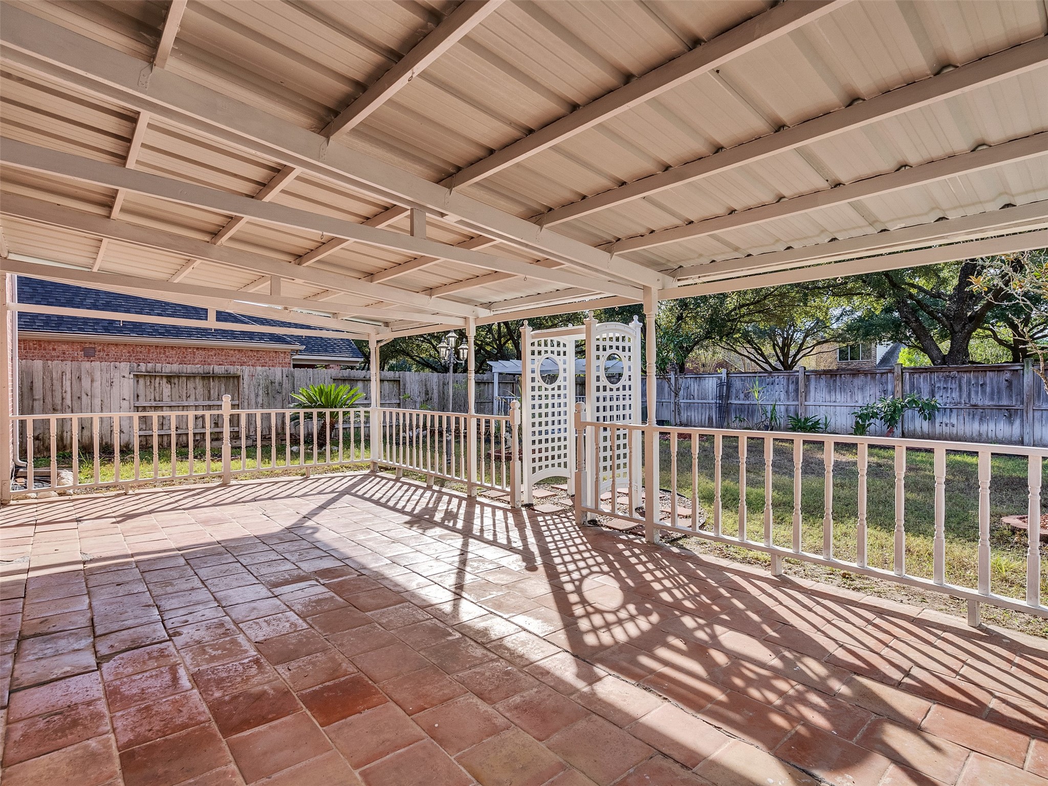 4815 Cottage Stone Lane Katy, TX 77449 - Photo 41 of 48 a view of a porch with a wooden fence