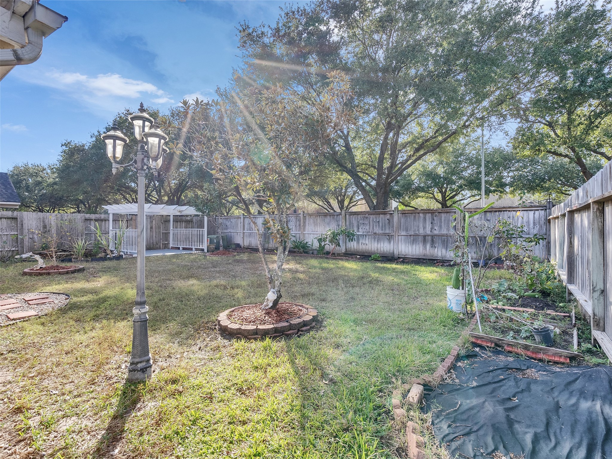 4815 Cottage Stone Lane Katy, TX 77449 - Photo 43 of 48 a swimming pool with wooden fence