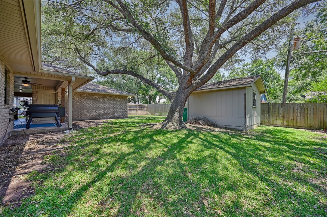 1600 Pecan Street Brenham, TX 77833 - Photo 28 of 33 View of covered patio, breezeway and large tree